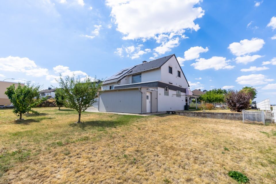 Modernisiertes Zweifamilienhaus mit Baugrundstück (optional) in Ober-Florstadt in Florstadt