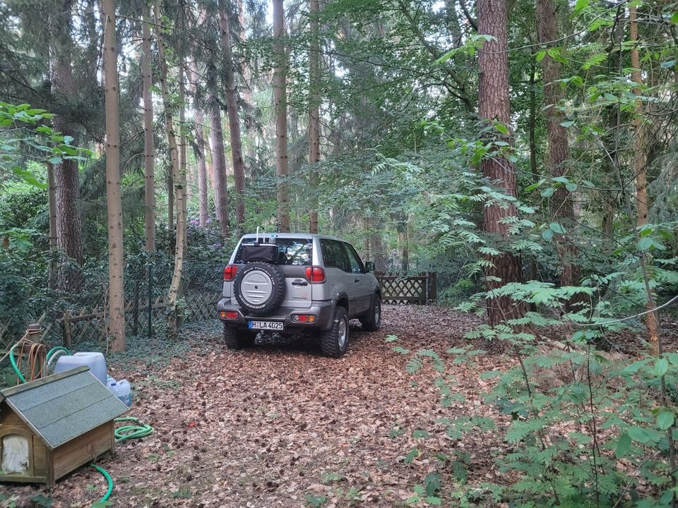 Wochenendhäuschen auf komplett eingezäuntem Waldgrundstück in Neustadt am Rübenberge