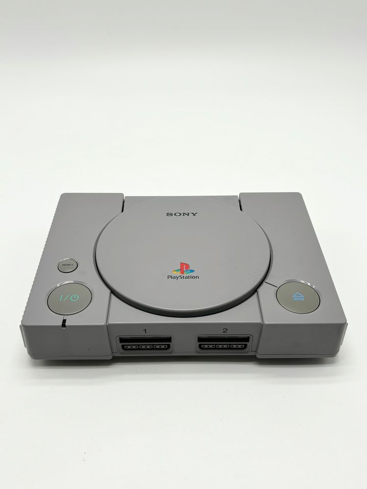 Playstation 1 PS1 Konsole inkl Kabeln und einem Controller in Filderstadt