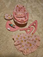 Puppen babytrage babyschale wippe  rosa wippe Spielzeug Püppchen Sachsen - Beucha Vorschau