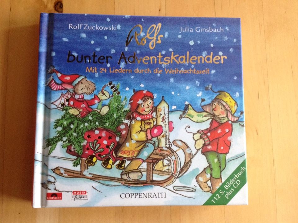 Rolfs bunter Adventskalender, CD mit Buch, neuwertig in Weißenohe