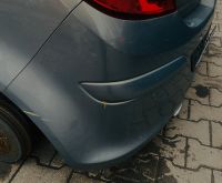 Opel Corsa E Stoßstange hinten grau GJM Pepper Dust Muskatgrau Nordrhein-Westfalen - Dörentrup Vorschau