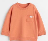 H&M Sweatshirt Pullover Pulli orange Baumwolle Gr 86 Nordrhein-Westfalen - Hiddenhausen Vorschau