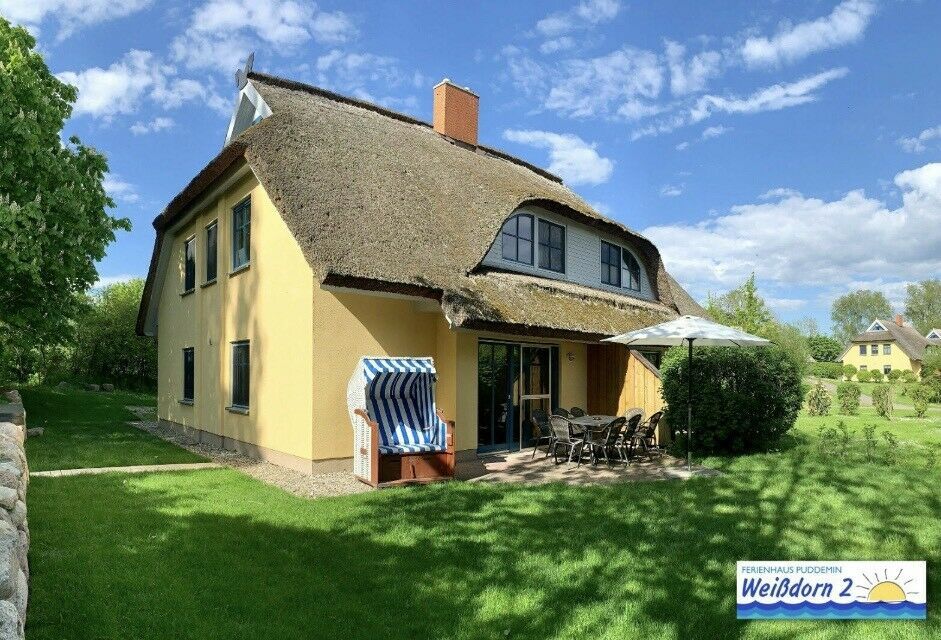 Ferienhaus Rügen Urlaub 4 Schlafzimmern, BehWhirlpSauna und Kamin in Poseritz