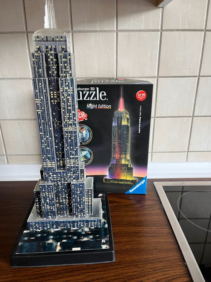 Puzzle Ravensburger 3D Empire State Building Night Edition in Hohenhorn