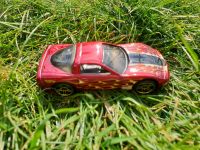 Kleines rotes Spielzeugauto aus Metall Niedersachsen - Rodewald Vorschau