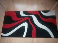 Teppich 150x80 cm schwarz rot weiß neuwertig Brandenburg - Grünheide (Mark) Vorschau