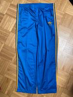 Adidad Firebird Vintage Sport Trainingshose Gr.D5 Blau/Orange Düsseldorf - Urdenbach Vorschau