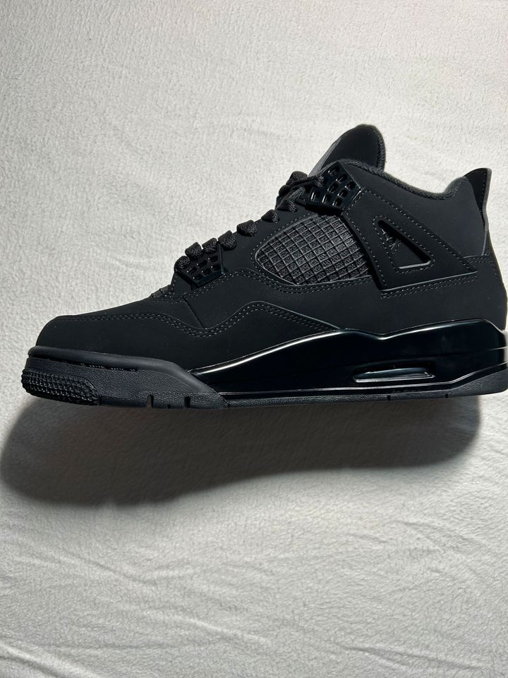 Jordan 4 Black Cats in Geesthacht