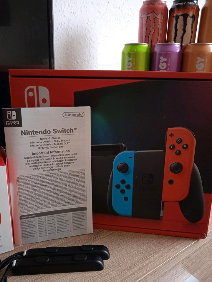 Nintendo Switch+Fernseher und Zubehör+Zwei Spiele in Minden