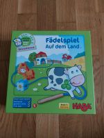 Haba Fädelspiel Auf dem Land aus Holz und Pappe Kinderspielzeug Hessen - Kelsterbach Vorschau