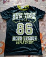 Jungen T-Shirt schwarz grün Basketball Gr. 146/152 Niedersachsen - Pattensen Vorschau