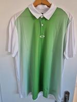OAKLEY HYDROLIX Poloshirt, Gr. XL, grün-weiß, NEU Nordrhein-Westfalen - Hilden Vorschau