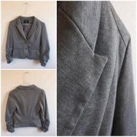 H&M Blazer Jacke kurz grau Gr. 34 Niedersachsen - Bad Bodenteich Vorschau