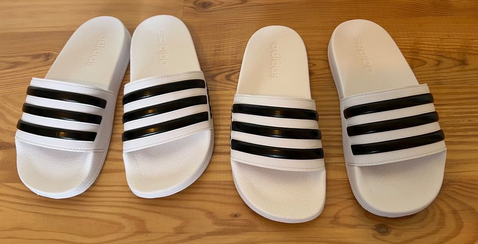 2 Paar Badesandalen „Adilette“ von Adidas, Größe 32 in Oldenburg