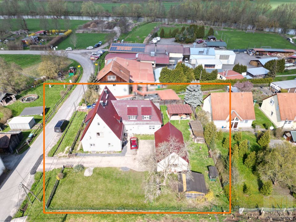 Kapitalanlage: Voll vermietetes 2-Familienhaus mit großem Garten | Nebengebäude mit 2 Garagen und Wohnraum |  Naturnahe Lage mit guter Verkehrsanbindung! in Uhlstädt-Kirchhasel