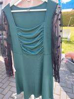 Elegantes schönes Kleid mit durchsichtigen Ärmel Gr. XL Berlin - Rudow Vorschau