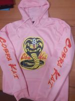 Cobra Kai Hoodie / Pullover, rosa, Gr. 170, NEU Bayern - Langquaid Vorschau