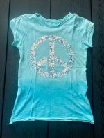 Schönes Peace Pailletten T-Shirt Blue Effect Gr. 146 / 152 Niedersachsen - Wendeburg Vorschau