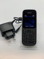 Nokia 100 mit Ladegerät Kr. München - Garching b München Vorschau