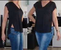 Orsay Top Shirt schwarz Schlitz Cut off S M 36 38 H&M Bershka Baden-Württemberg - Neckarsulm Vorschau