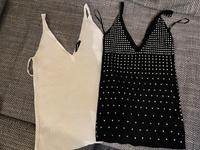 Tops, 2 Stück, weiß, schwarz/Glitzer, Größe M/L Nordrhein-Westfalen - Mönchengladbach Vorschau