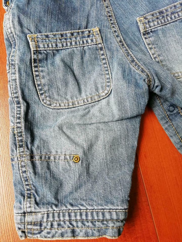 Latzhose H&M Gr. 74 Jeans Baby Schlupfhose in Oyten