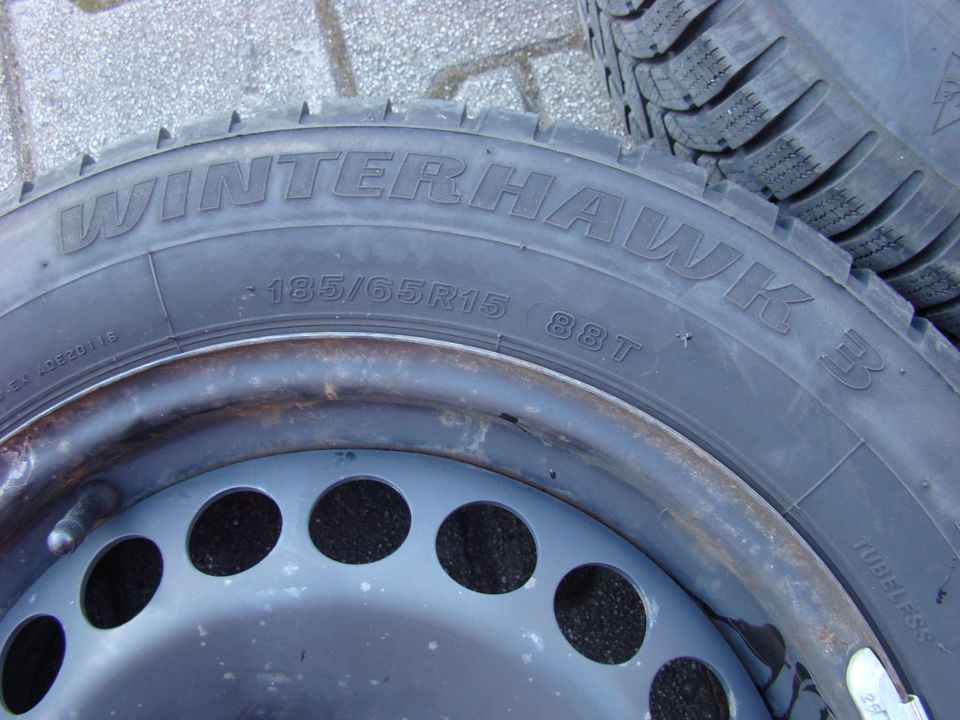 4 Räder Opel Corsa D / 185/65 R15 88T M+S Firestone +  6x15 ET39 in Darmstadt