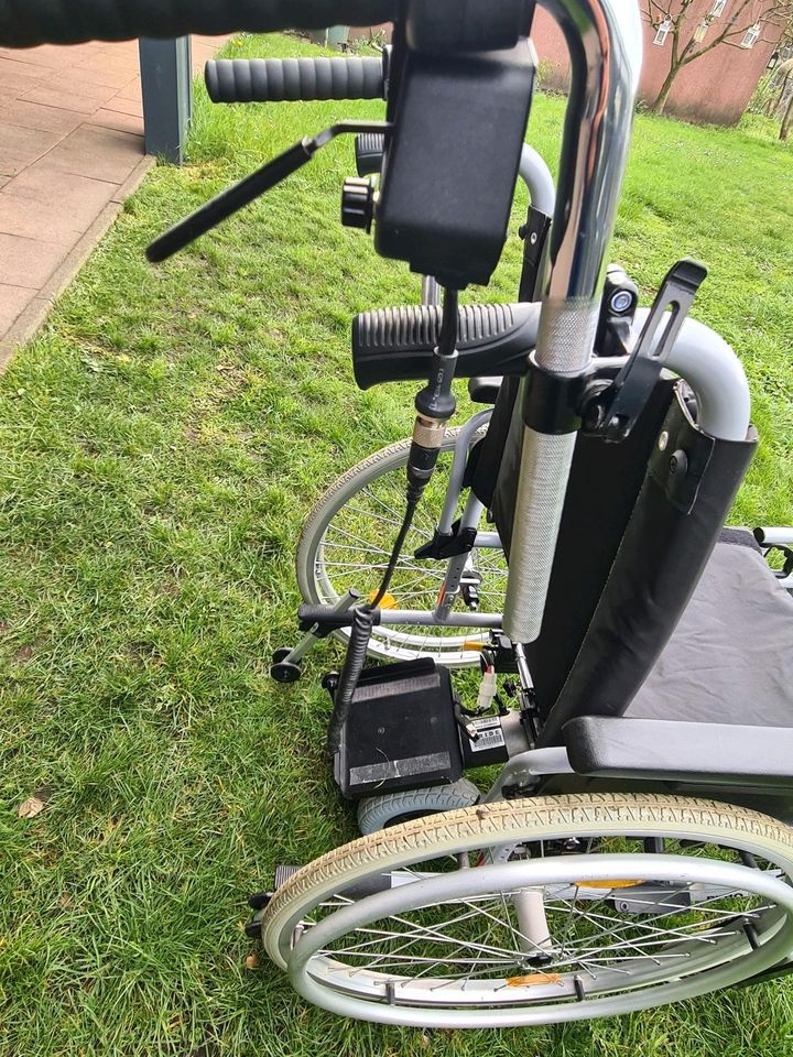 Rollstuhl mit Hilfsmotor ohne Batteri und Ladegeräte in Dinslaken
