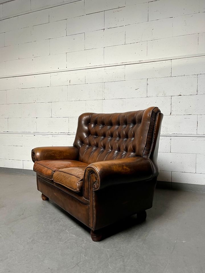 Antik Ledersofa Vintage Chesterfield Art Deco Ohrensessel in Mönchengladbach