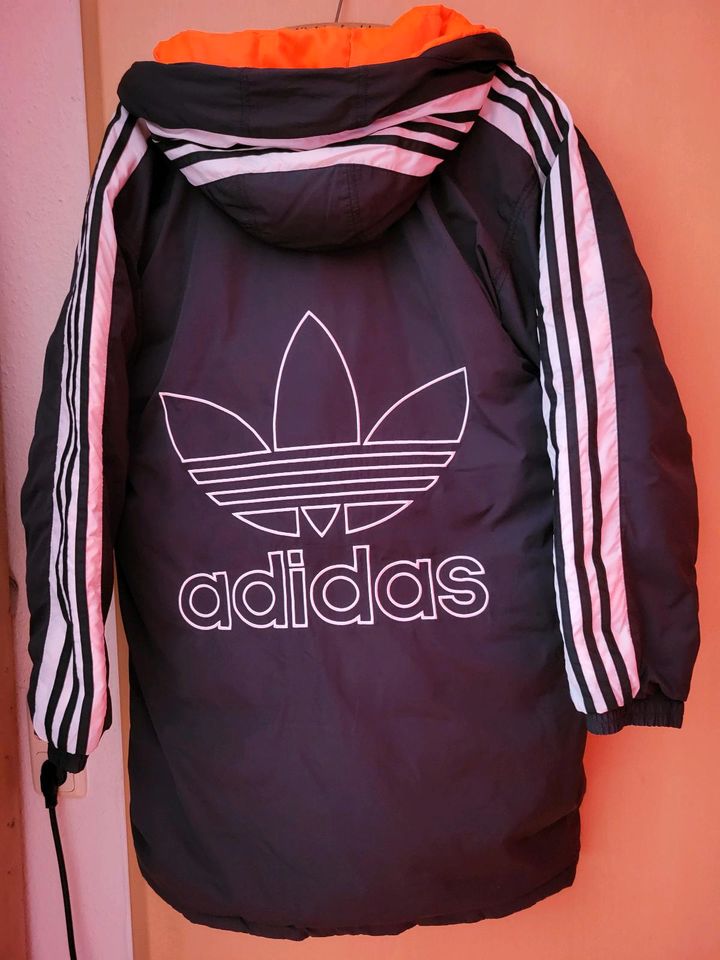 Adidas Mantel schwarz außen innen Orange in Kappeln