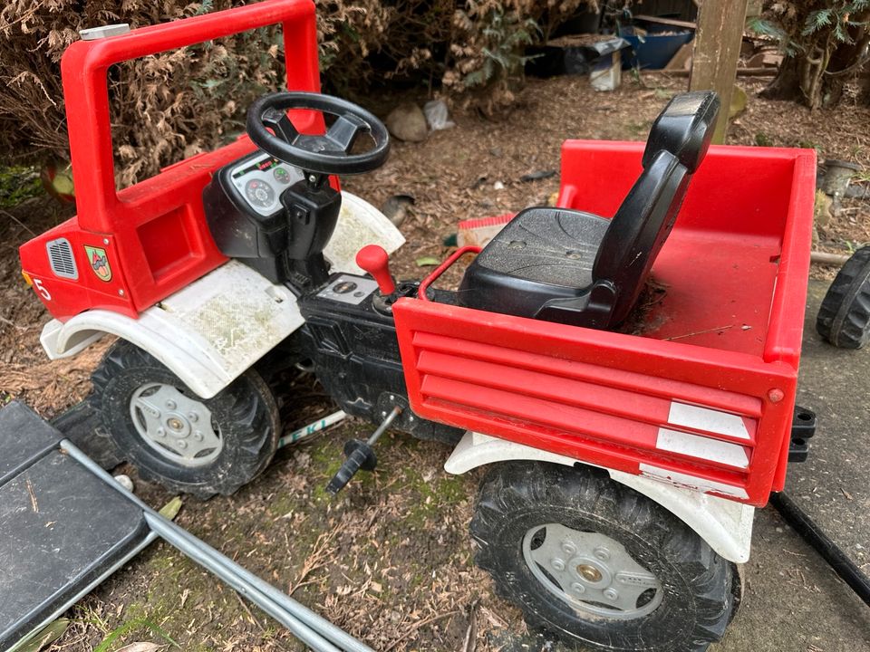 Diverse Kinderfahrzeuge Kettcar Bagger in Bedburg