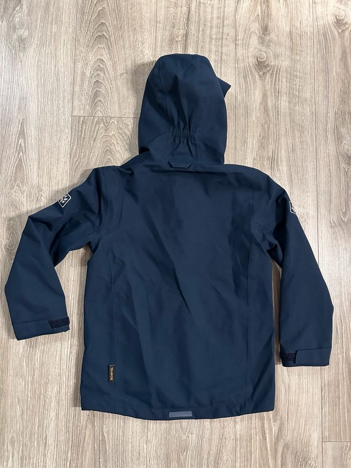 Jack Wolfskin Mädchen Wind- und Regenjacke Dunkelblau Gr. 128 in Berlin