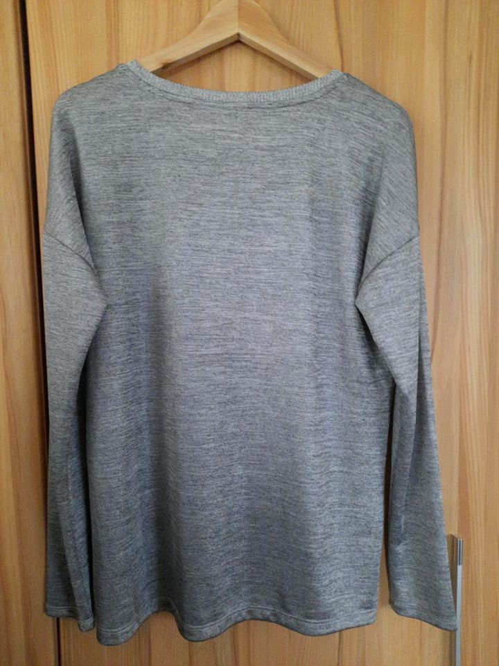 Pullover mit Metallic Effekt in Wuppertal