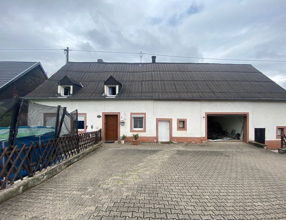 Einfamilienhaus in zentraler Lage und mit Garten sucht neuen Eigentümer