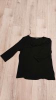 Schwarzes Shirt mit Knotendetail und 3/4 Arm 44/46 Wuppertal - Heckinghausen Vorschau