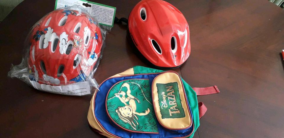 2 Helme Kinder, 1xneu, Rucksack in Amt Neuhaus