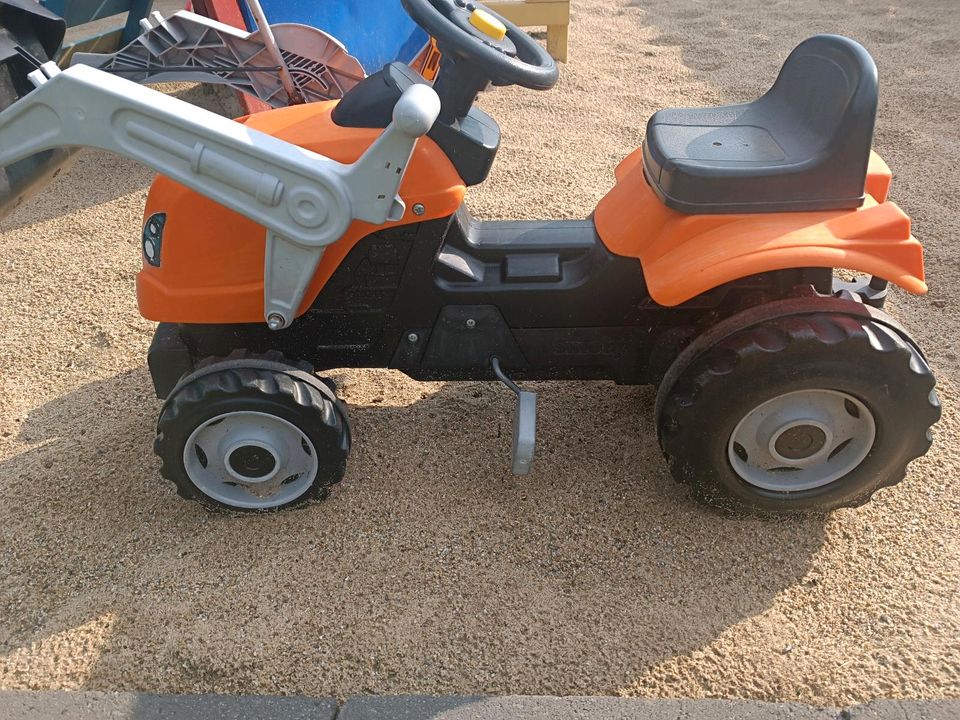 Tretbagger Traktor mit Schaufel Garten in Kleve