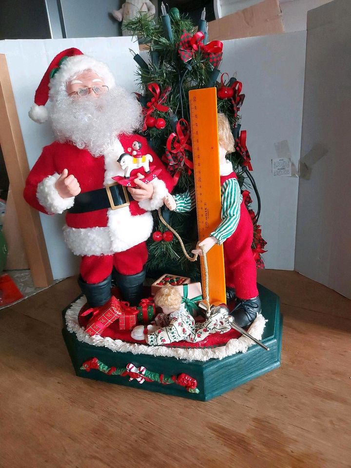 Holidays Creations Weihnachtsmann Santa with children by Tree in Mainburg