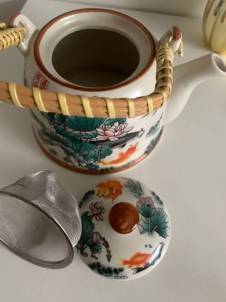 Teekanne bunt mit Sieb in Harsum