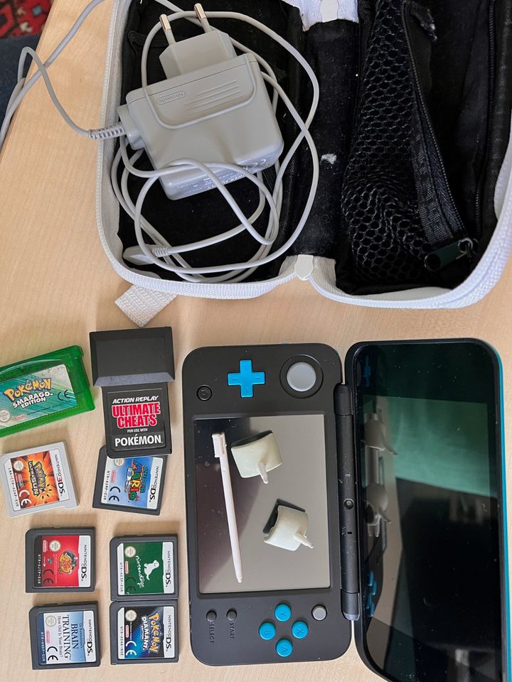 Nintendo DS mit 7 Spielen, komplett & Adaptern in Reken