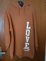 C&A Clockhouse Pullover/Hoodie mit Schriftzug "Love always wins" Nordrhein-Westfalen - Düren Vorschau