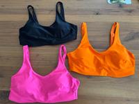 3 x Esmara Bustier Bikini Oberteile Gr. 42 schwarz, pink, orange Baden-Württemberg - Deizisau  Vorschau