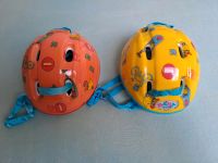 Zwei Puppen Helme Baby Born gelb, orange-rot Hessen - Lampertheim Vorschau