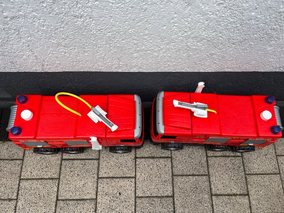 Kinder Feuerwehrauto/ Rutscheauto mit Wasserspritze in Neukirchen-Vluyn