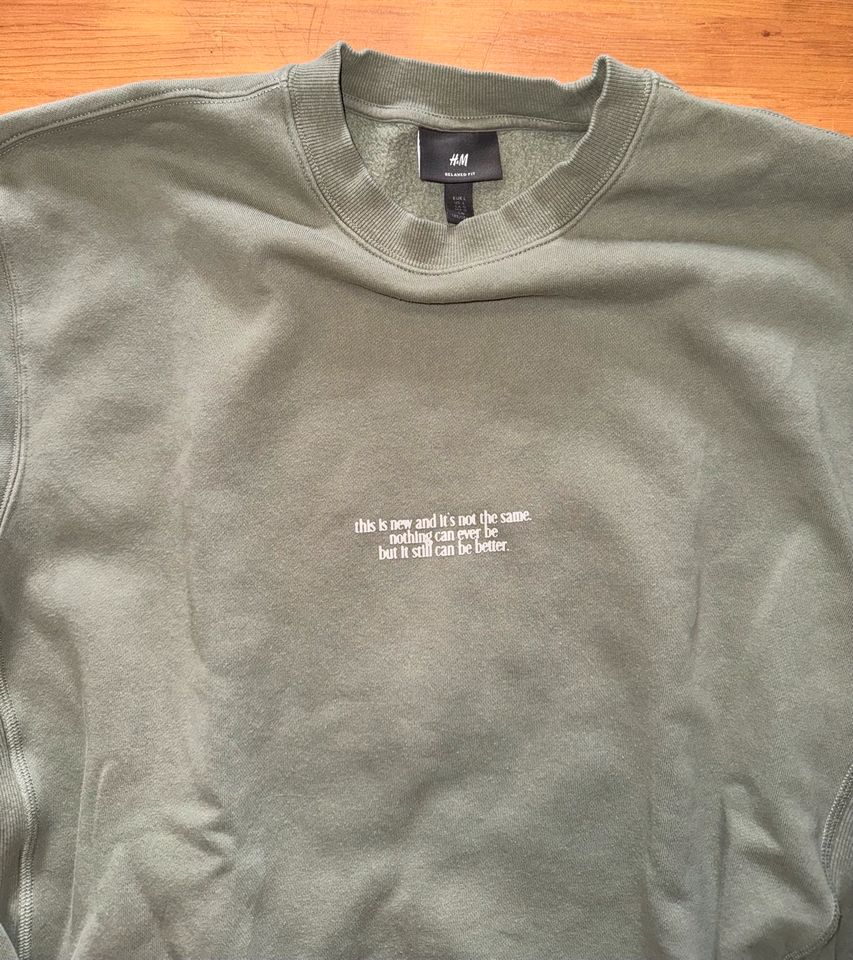 Sweatshirt Pullover Pulli Marke H&M Gr. L back print khaki in Neuhofen