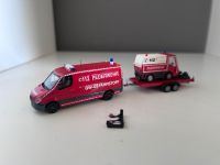 Herpa MB Sprinter 319 Feuerwehr GW-Gefahrstoff mit Kehrmaschine Nordrhein-Westfalen - Jülich Vorschau