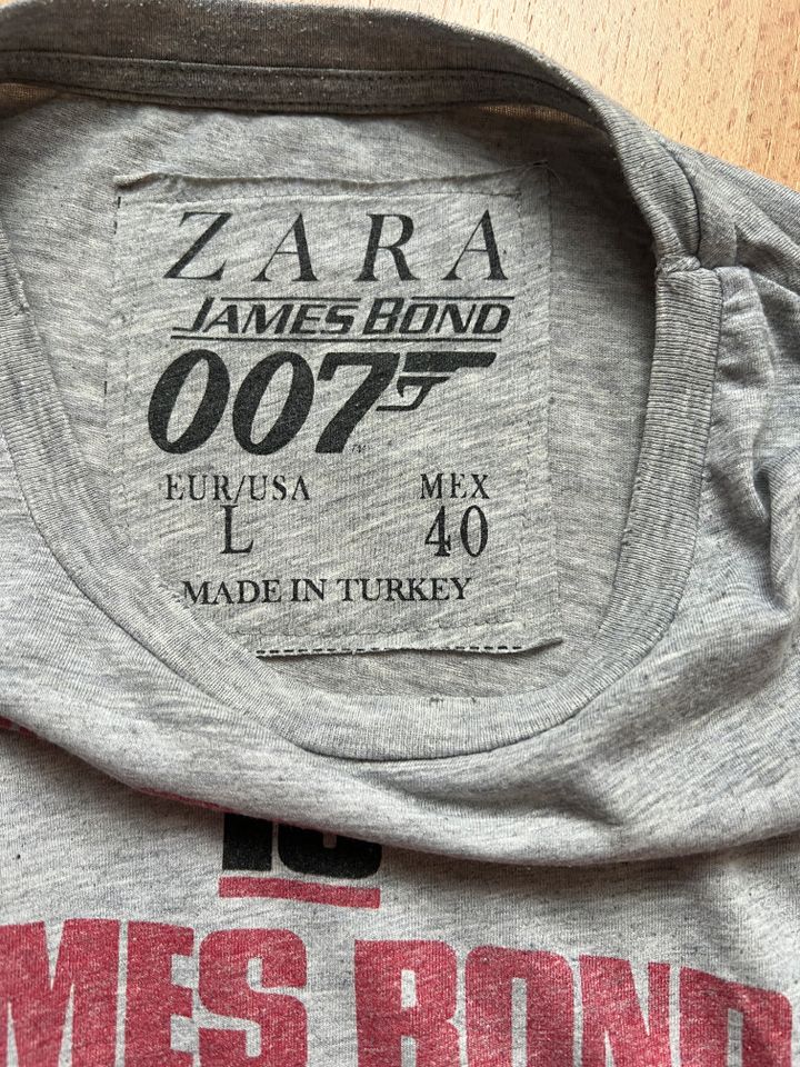 Tolles James Bond x Zara T-Shirt, Größe L, Grau, top! in Leutenbach