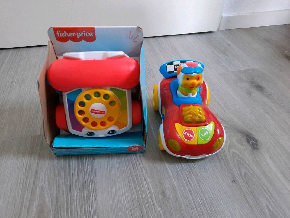 Vtech 123 Autospass + Fisherprice Plappertelefon in Esslingen