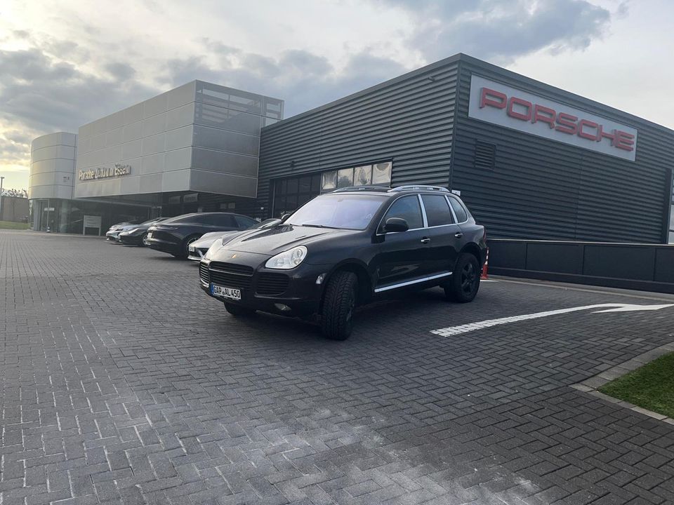 Porsche Cayenne Turbo Turbo SCHECKHEFT bei Porsche in Ratingen